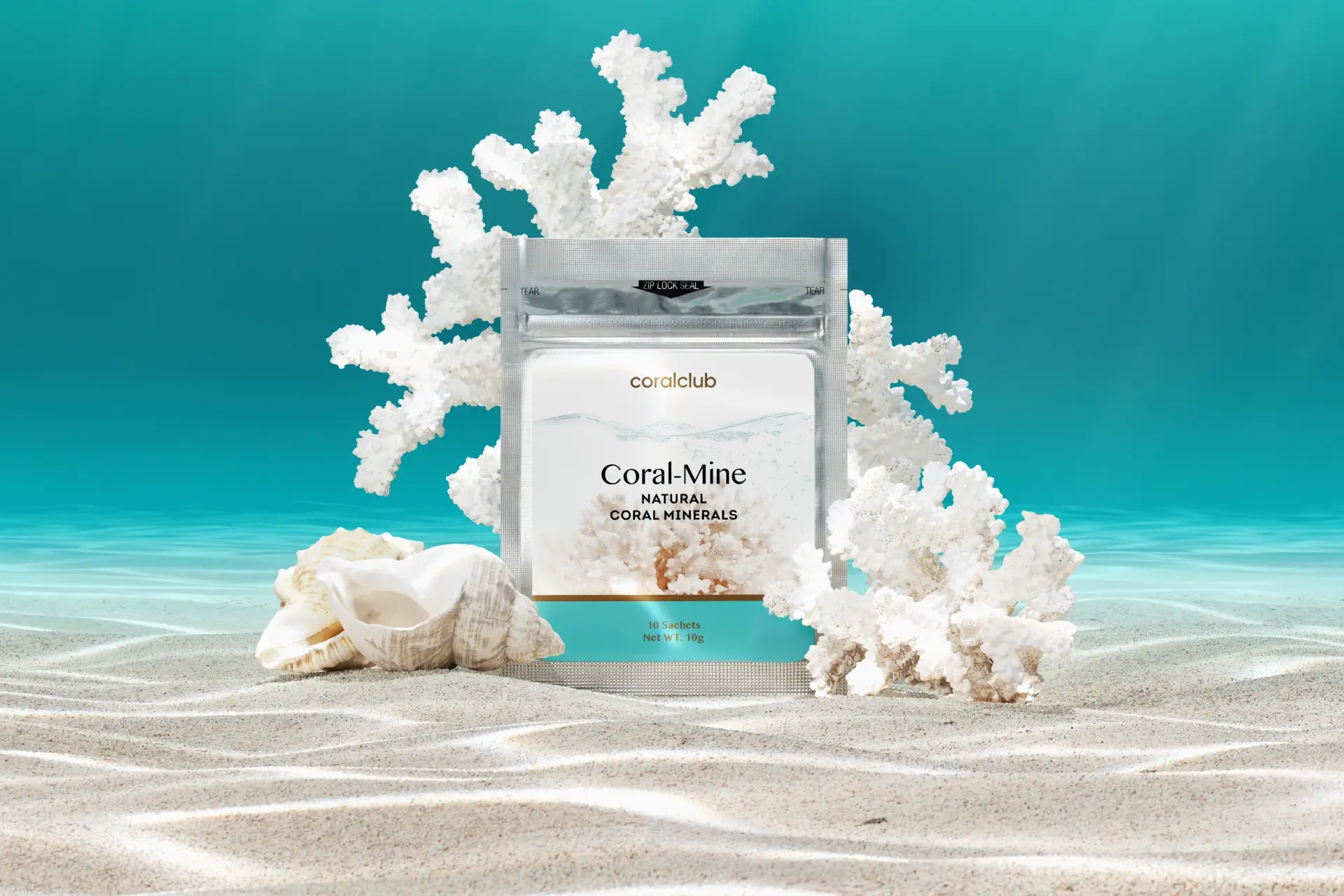 Coral-Mine sachets in an aesthetic lifestyle arrangement with marine motifs